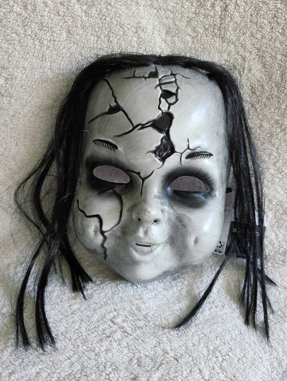 New Terror Tot face Halloween mask with cracked doll face & black synthetic hair